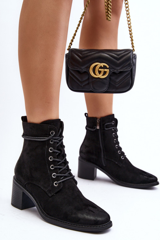 Stivali con tacco basso e lacci in colore nero Serellia