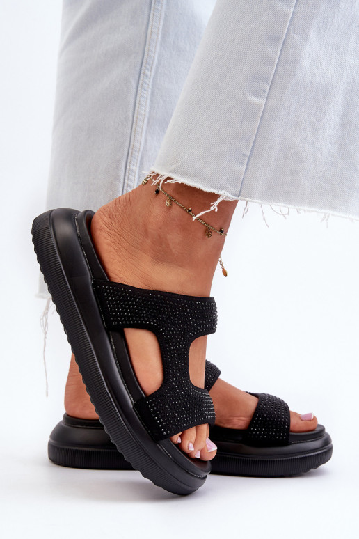 Infradito da donna decorate con plateau in colore nero Jestella