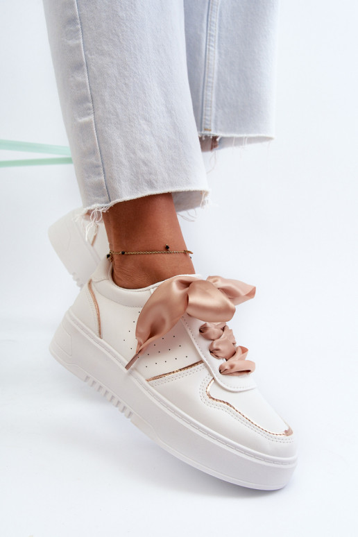 Scarpe modello sneakers con plateau in colore bianco Tessama