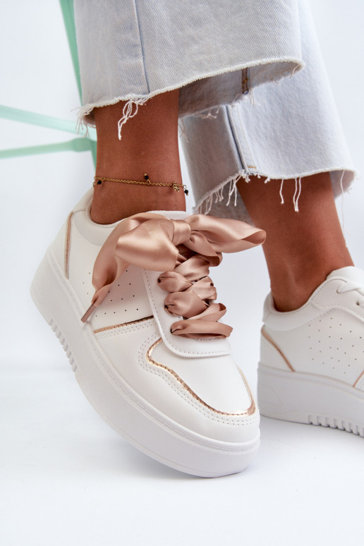 Scarpe modello sneakers con plateau in colore bianco Tessama