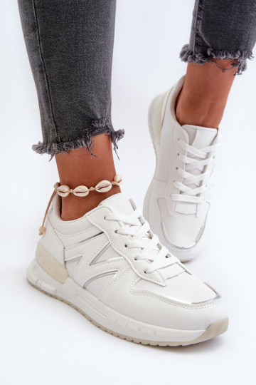 Scarpe modello sneakers realizzate in eco pelle di colore bianco Kaimans