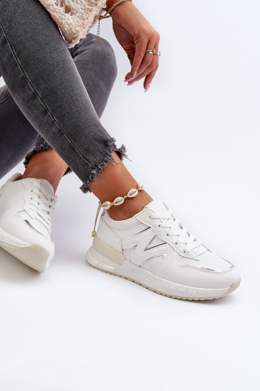 Scarpe modello sneakers realizzate in eco pelle di colore bianco Kaimans