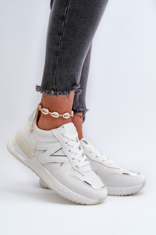 Scarpe modello sneakers realizzate in eco pelle di colore bianco Kaimans