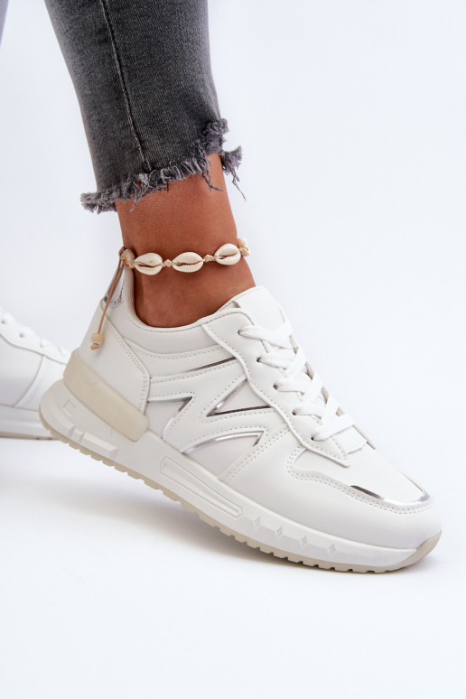 Scarpe modello sneakers realizzate in eco pelle di colore bianco Kaimans