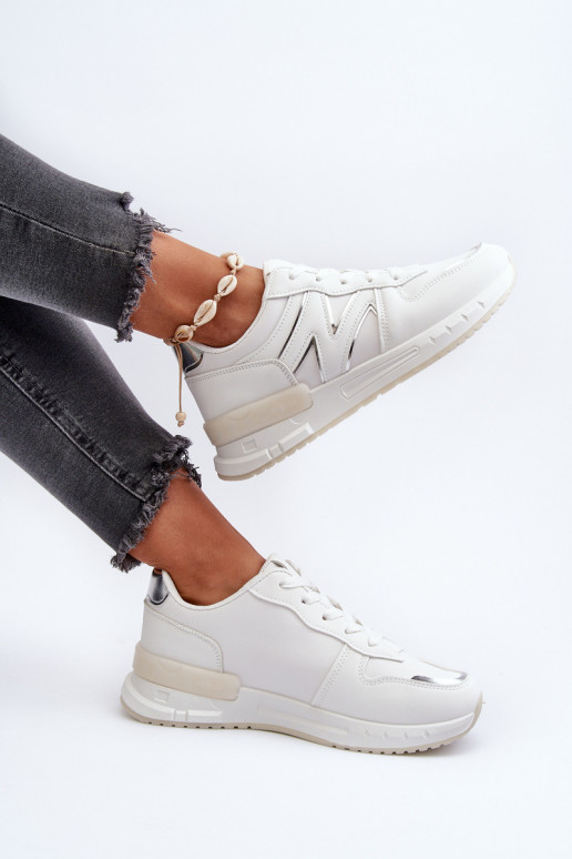 Scarpe modello sneakers realizzate in eco pelle di colore bianco Kaimans