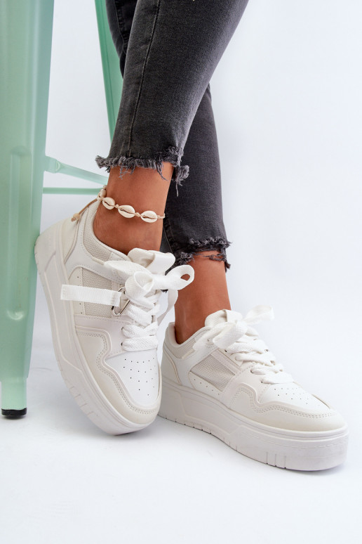 Scarpe modello sneakers con plateau realizzate in eco pelle nel colore bianco Moun