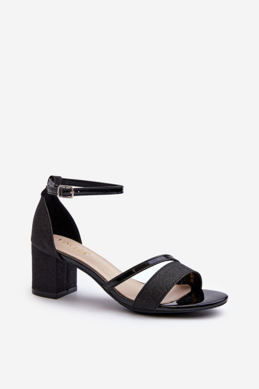 Sandali lucidi con tacco basso in colore nero Ploemis