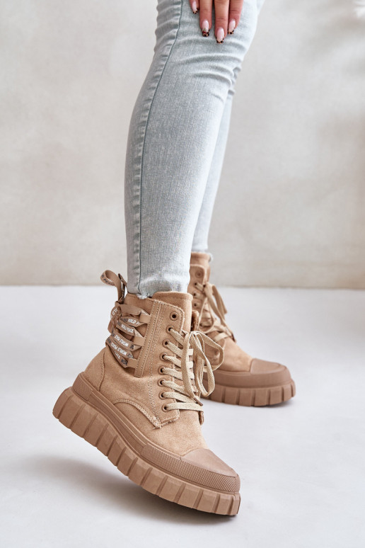 Stivali da donna con una piattaforma Con decorazioni Allacciaturam colore marrone Edidda