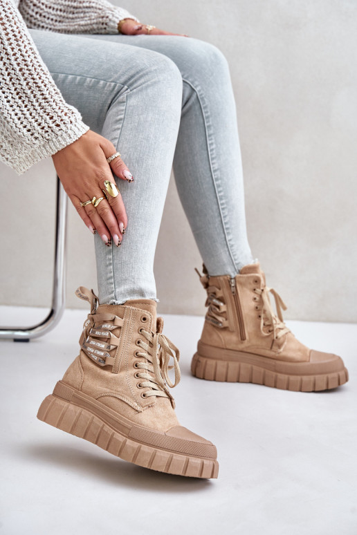 Stivali da donna con una piattaforma Con decorazioni Allacciaturam colore marrone Edidda