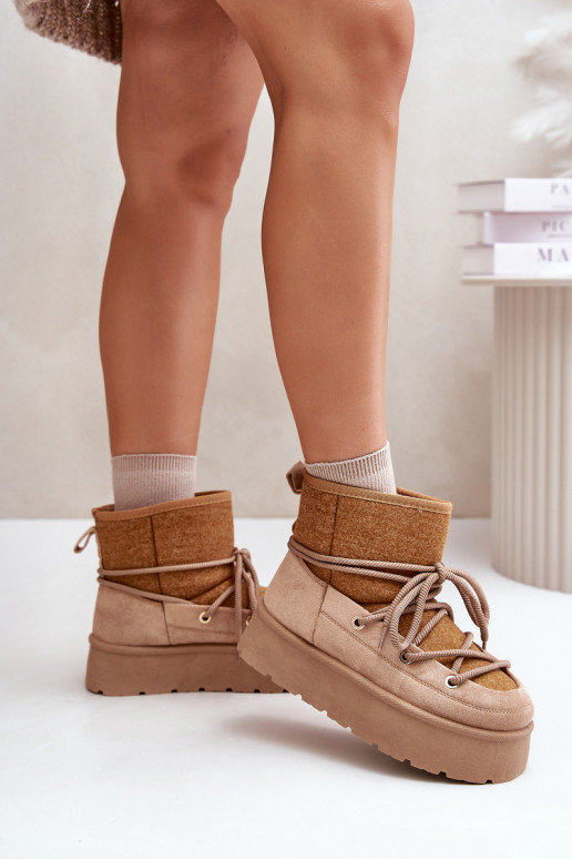 Stivali da neve con dettagli eleganti con una piattaforma colore marrone Devevora Stivali da neve con dettagli eleganti con una piattaforma colore marrone Devevora