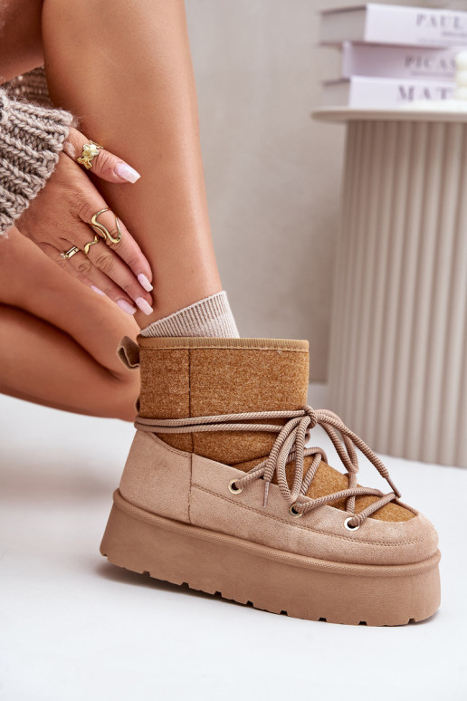 Stivali da neve con dettagli eleganti con una piattaforma colore marrone Devevora Stivali da neve con dettagli eleganti con una piattaforma colore marrone Devevora