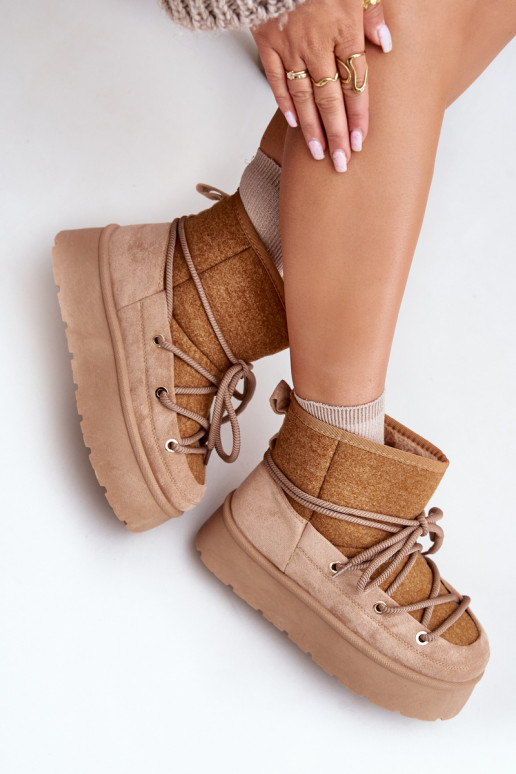 Stivali da neve con dettagli eleganti con una piattaforma colore marrone Devevora Stivali da neve con dettagli eleganti con una piattaforma colore marrone Devevora