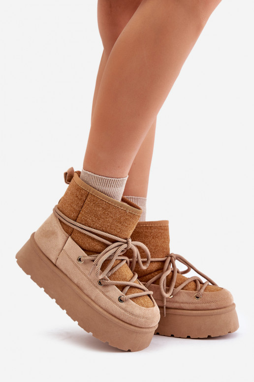 Stivali da neve con dettagli eleganti con una piattaforma colore marrone Devevora Stivali da neve con dettagli eleganti con una piattaforma colore marrone Devevora