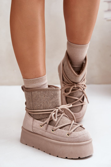 Stivali da neve con dettagli eleganti e plateau in beige 2