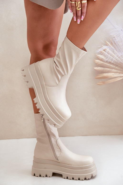 Stivali con una piattaforma colore avorio Florinara Stivali con una piattaforma colore avorio Florinara