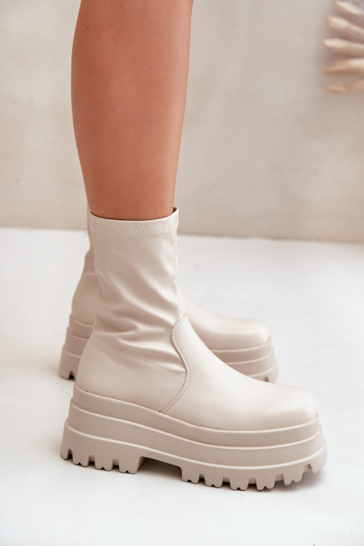 Stivali con una piattaforma colore avorio Florinara Stivali con una piattaforma colore avorio Florinara