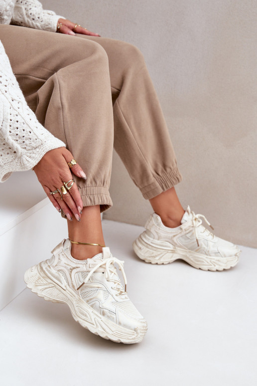 Stivaletti modello sneakers da donna Z Przetarciami con platform color sabbia SeladĮen