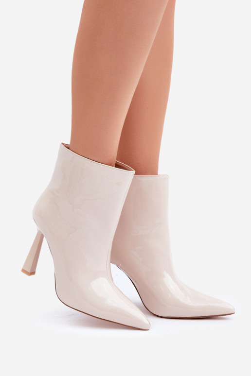 Stivaletti con effetto vernice modello slip-on color avorio Seliri