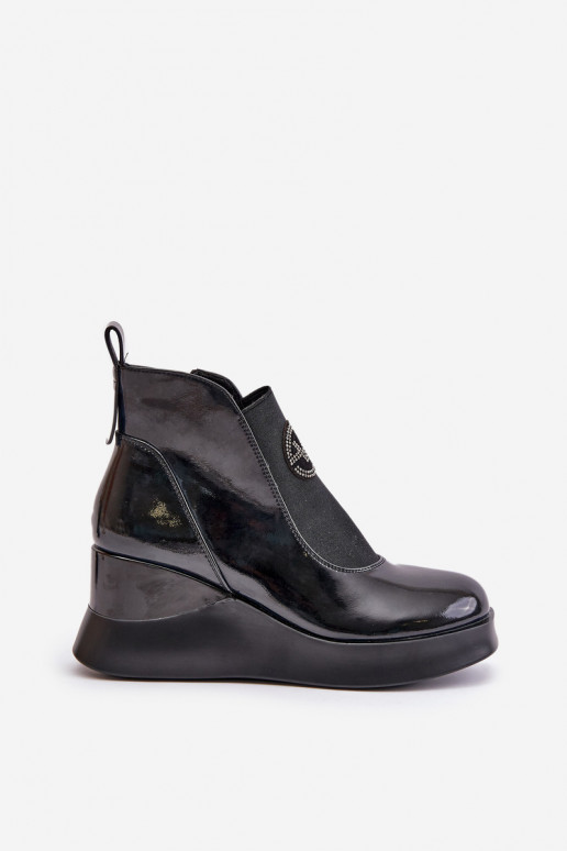 Stivaletti verniciati imbottiti... Stivaletti verniciati imbottiti...