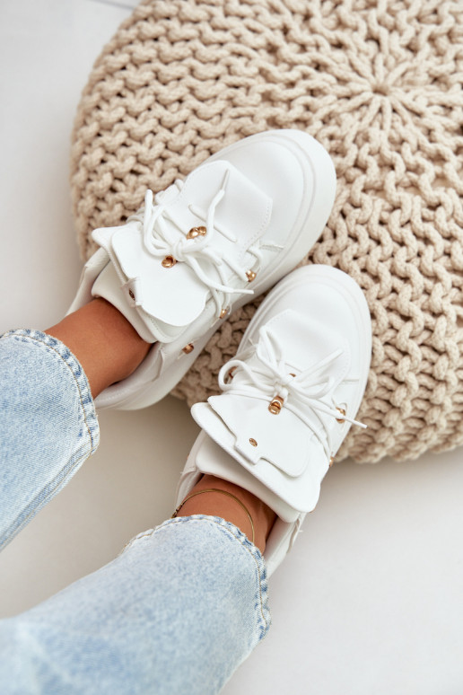 Scarpe modello sneakers Femminile con una piattaforma Colore bianco Dolistana Scarpe modello sneakers Femminile con una piattaforma Colore bianco Dolistana