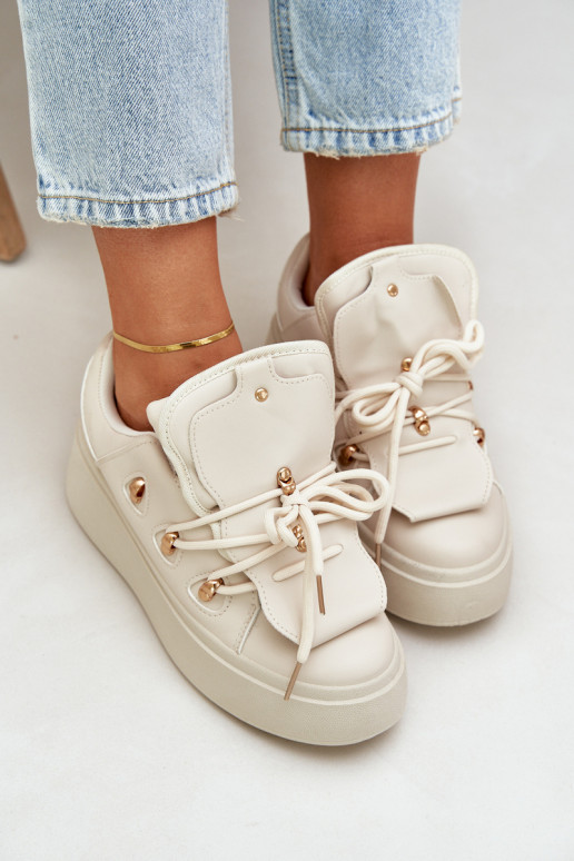 Scarpe modello sneakers Femminile con una piattaforma beige Dolistana Scarpe modello sneakers Femminile con una piattaforma beige Dolistana