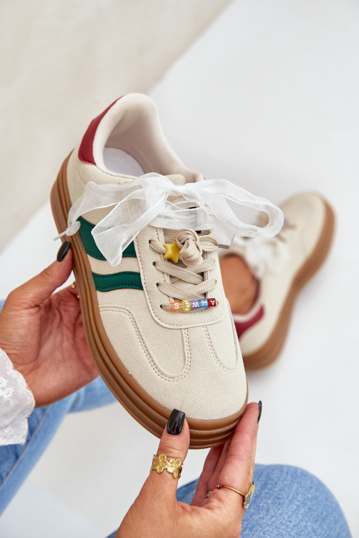 Scarpe modello sneakers Femminile Z Przypinkami beige Jariana Scarpe modello sneakers Femminile Z Przypinkami beige Jariana