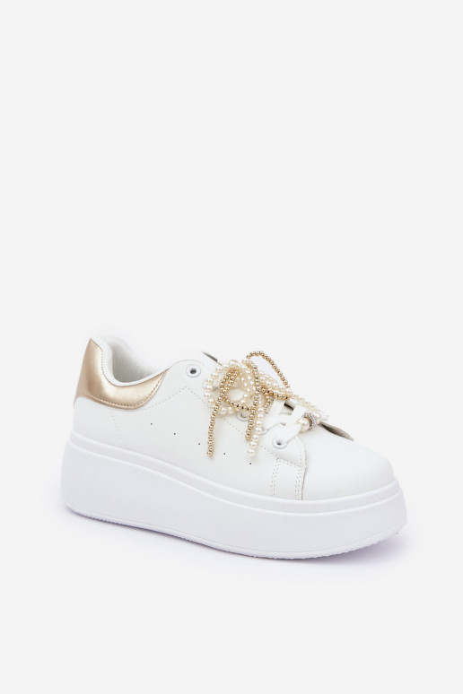 Scarpe modello sneakers Femminile con una piattaforma con bellissimi dettagli Bianco-colore dorato Lerissna