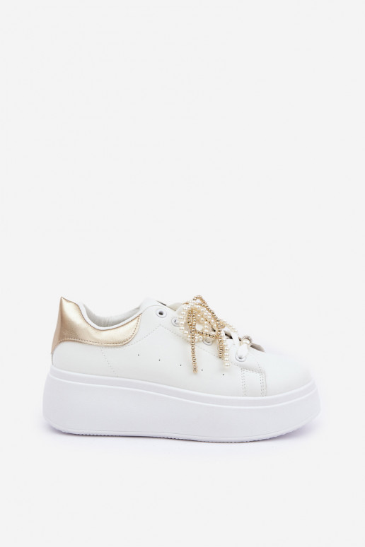 Scarpe modello sneakers Femminile con una piattaforma con bellissimi dettagli Bianco-colore dorato Lerissna