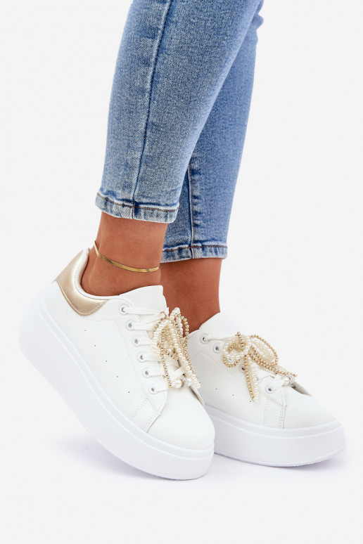 Scarpe modello sneakers Femminile con una piattaforma con bellissimi dettagli Bianco-colore dorato Lerissna