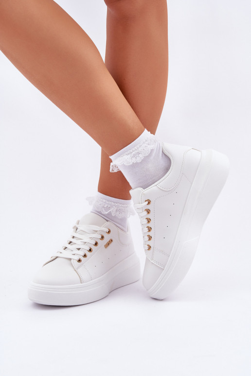 Scarpe modello sneakers Femminile con una piattaforma in ecopelle Colore bianco Lelandine Scarpe modello sneakers Femminile con una piattaforma in ecopelle Colore bianco Lelandine