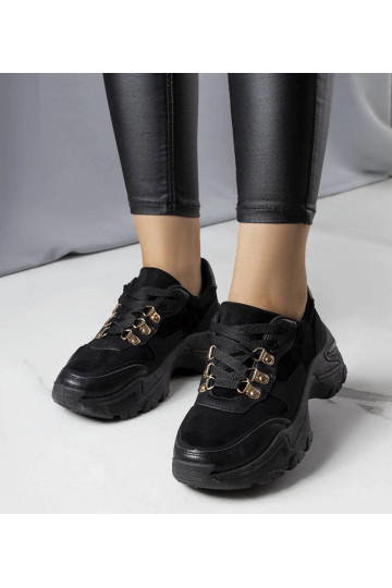 Sneakers nere in materiali...