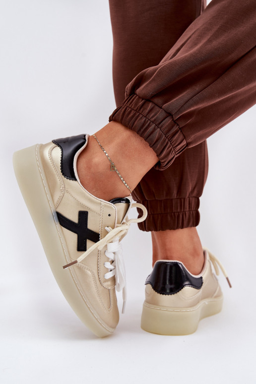 Basso scarpe da ginnastica Femminile colore dorato Zelevelis