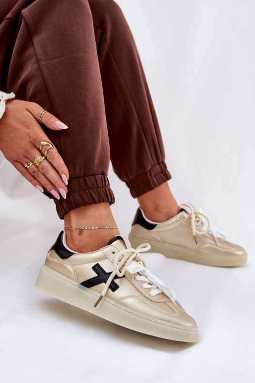 Basso scarpe da ginnastica Femminile colore dorato Zelevelis