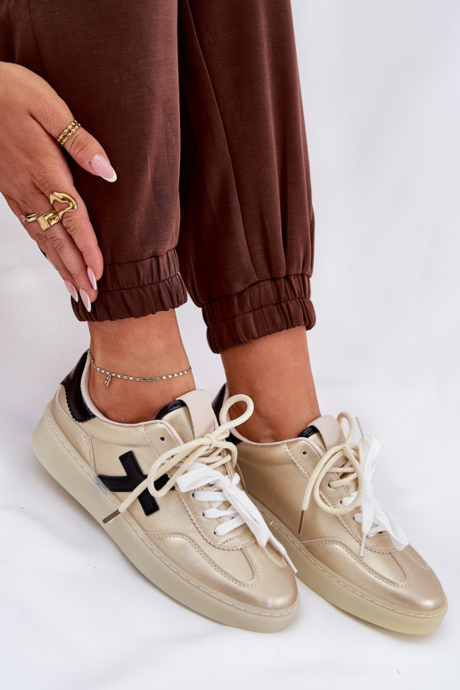 Basso scarpe da ginnastica Femminile colore dorato Zelevelis