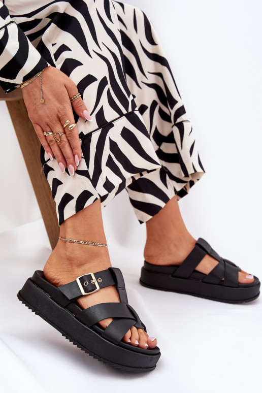 Pantofole da donna con una piattaforma con strisce I con fibbie colore nero Elimessa Pantofole da donna con una piattaforma con strisce I con fibbie colore nero Elimessa