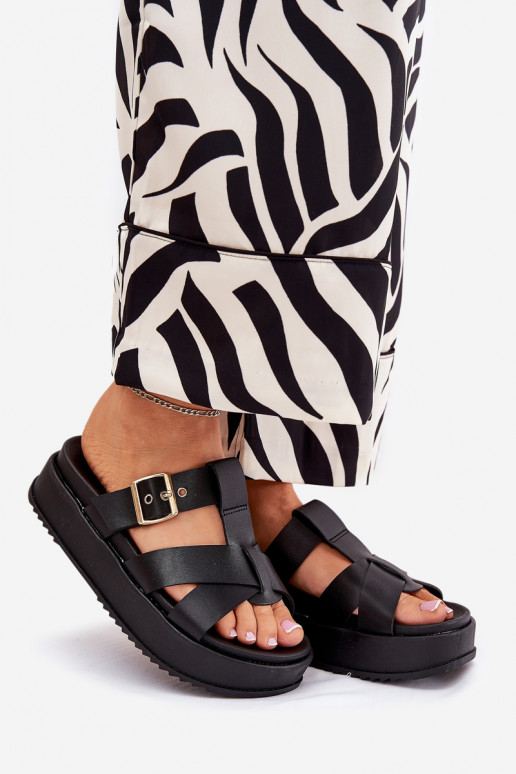 Pantofole da donna con una piattaforma con strisce I con fibbie colore nero Elimessa Pantofole da donna con una piattaforma con strisce I con fibbie colore nero Elimessa
