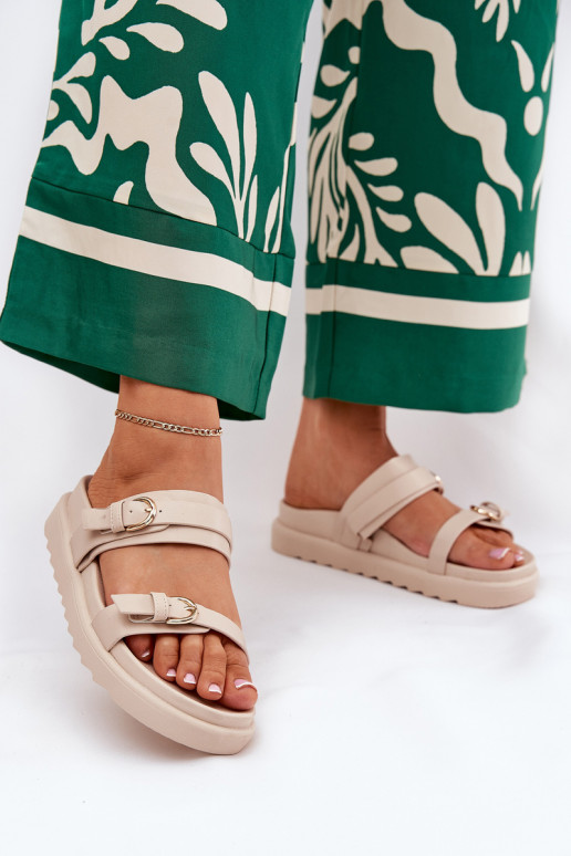 Pantofole da donna con una piattaforma Ze colore doratomi con fibbiemi beige INernone