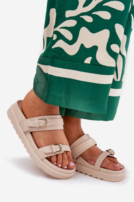 Pantofole da donna con una piattaforma Ze colore doratomi con fibbiemi beige INernone