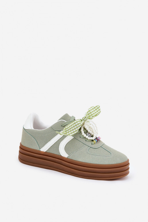 Scarpe modello sneakers Femminile con una piattaforma con bellissimi dettagli colore verde Vinness